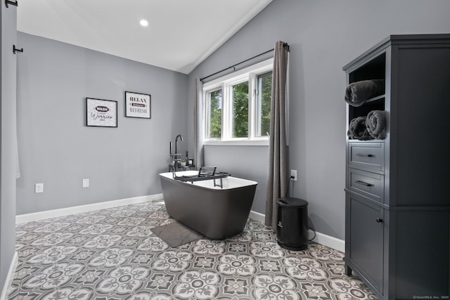 117 Mansfield Grove Rd, East Haven, CT 06512 - full bath with vaulted ceiling, a freestanding tub, and recessed lighting
