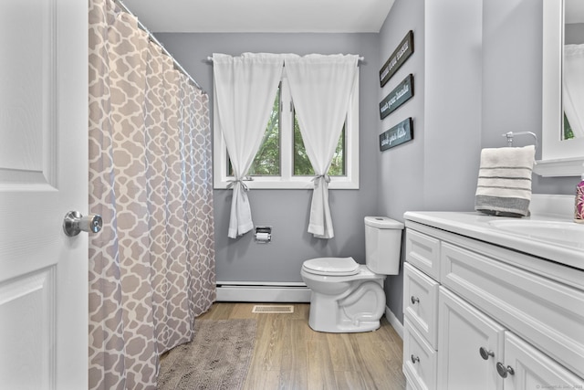 117 Mansfield Grove Rd, East Haven, CT 06512 - bathroom featuring vanity, wood finished floors, and a baseboard heating unit