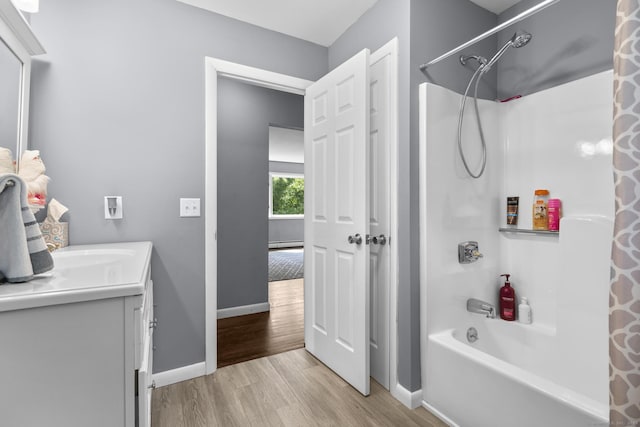 117 Mansfield Grove Rd, East Haven, CT 06512 - full bathroom with shower / tub combo, wood finished floors, vanity, and a baseboard radiator