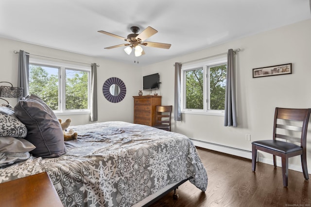 117 Mansfield Grove Rd, East Haven, CT 06512 - bedroom with a baseboard heating unit, multiple windows, dark wood-style flooring, and ceiling fan