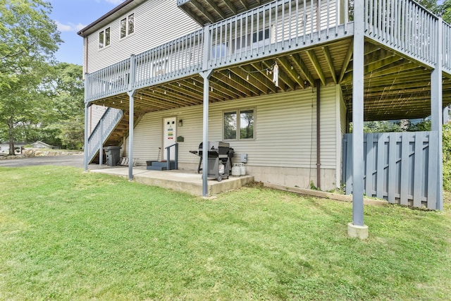 117 Mansfield Grove Rd, East Haven, CT 06512 - back of house with a patio area, a deck, and a lawn