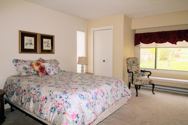 carpeted bedroom with a closet