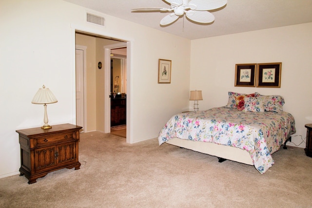 bedroom with carpet, baseboards, and a ceiling fan