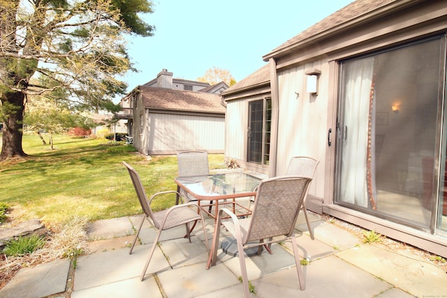 view of patio with outdoor dining space