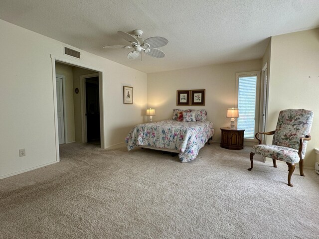 336 Heritage Vlg Unit B, Southbury, CT 06488 - bedroom with carpet flooring, a textured ceiling, and a ceiling fan