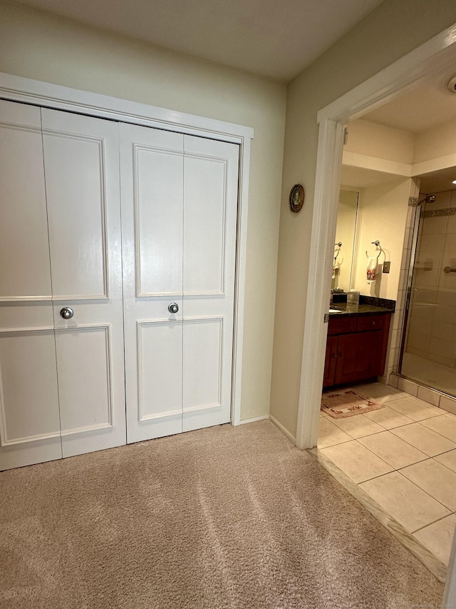 336 Heritage Vlg Unit B, Southbury, CT 06488 - bedroom with a closet, light colored carpet, and ensuite bathroom