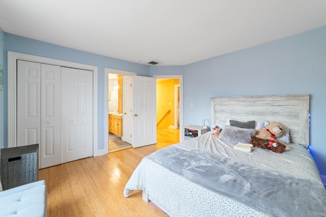 24 Scott Rd, Oxford, CT 06478 - bedroom with light wood-style flooring, ensuite bath, and a closet