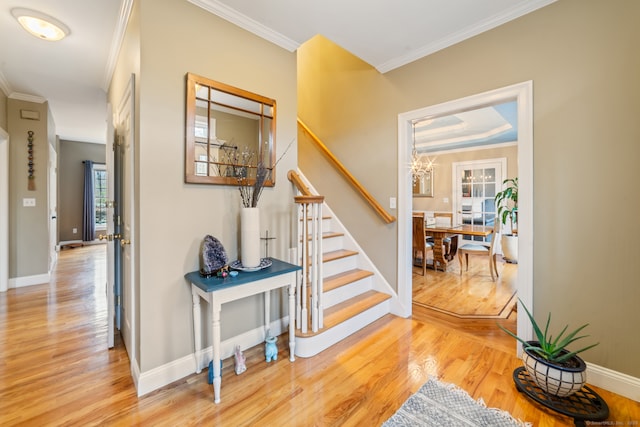 24 Scott Rd, Oxford, CT 06478 - stairs featuring wood finished floors, crown molding, and baseboards