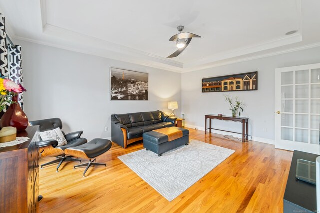24 Scott Rd, Oxford, CT 06478 - living room with a tray ceiling, wood finished floors, ornamental molding, a ceiling fan, and baseboards