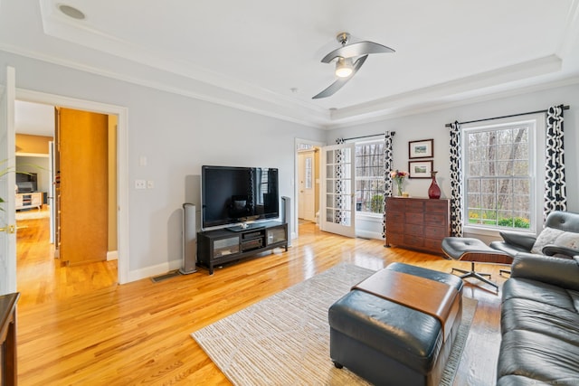 24 Scott Rd, Oxford, CT 06478 - living room with a raised ceiling, light wood finished floors, ornamental molding, a ceiling fan, and baseboards