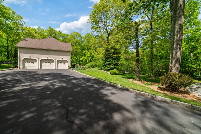 24 Scott Rd, Oxford, CT 06478 - view of home's exterior featuring asphalt driveway