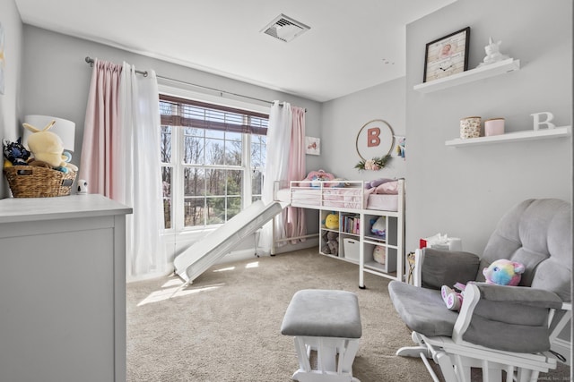 bedroom featuring visible vents and carpet