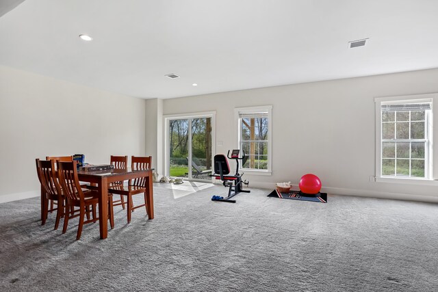 carpeted dining area with visible vents, recessed lighting, and baseboards