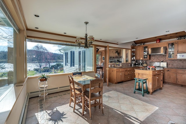 dining room with crown molding, recessed lighting, a chandelier, and light tile patterned floors