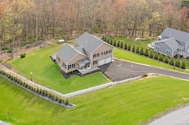 aerial view with a wooded view