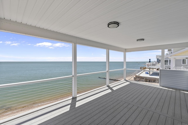 deck featuring a water view