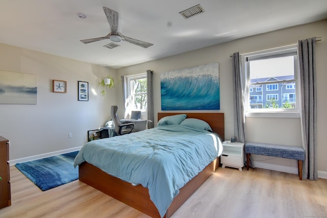 53 E Broadway Unit D, Milford, CT 06460 - bedroom with a ceiling fan, visible vents, wood finished floors, and baseboards