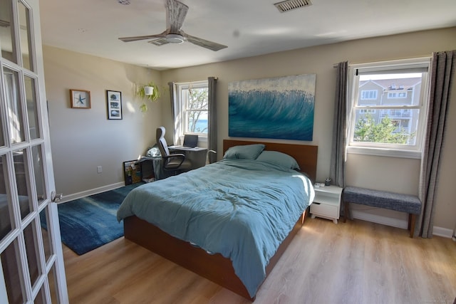 53 E Broadway Unit D, Milford, CT 06460 - bedroom featuring visible vents, wood finished floors, and baseboards