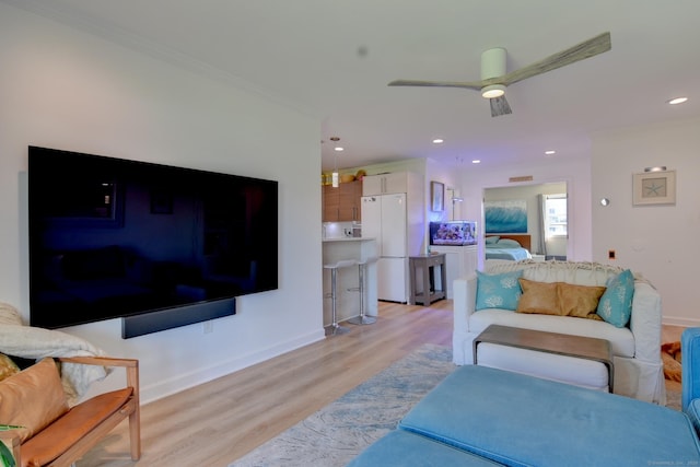 53 E Broadway Unit D, Milford, CT 06460 - living area with recessed lighting, light wood-style flooring, ornamental molding, ceiling fan, and baseboards