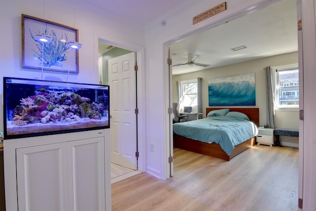 53 E Broadway Unit D, Milford, CT 06460 - bedroom with baseboards, visible vents, and light wood finished floors