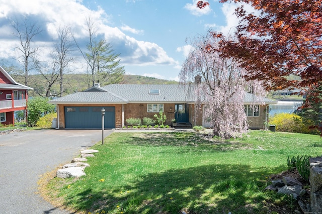70 N Lake Shore Dr, Brookfield, CT 06804 - view of front of property with an attached garage, driveway, and a front yard