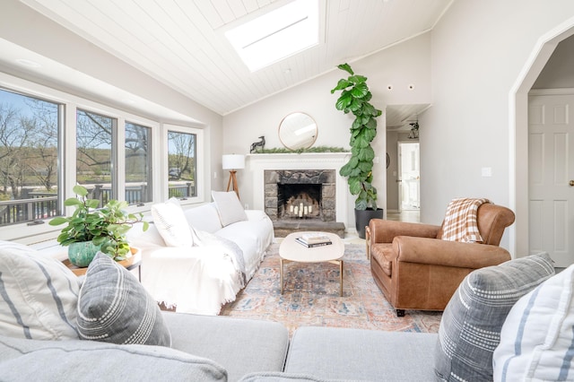 70 N Lake Shore Dr, Brookfield, CT 06804 - living room with vaulted ceiling and a stone fireplace