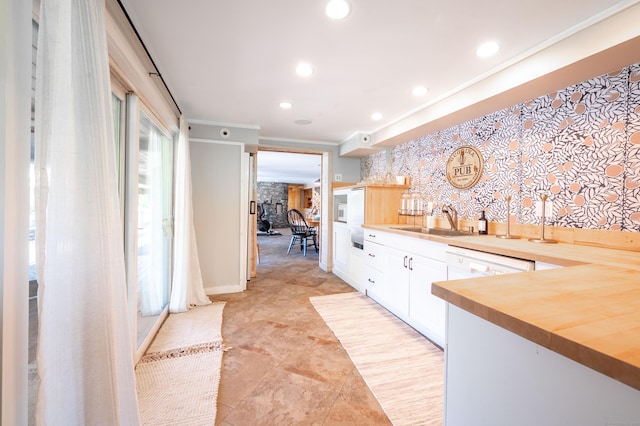 70 N Lake Shore Dr, Brookfield, CT 06804 - kitchen featuring backsplash, a sink, white cabinets, recessed lighting, and butcher block countertops