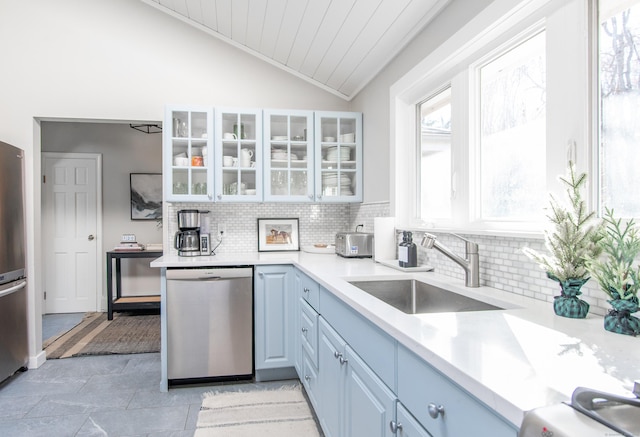 70 N Lake Shore Dr, Brookfield, CT 06804 - kitchen featuring decorative backsplash, vaulted ceiling, a sink, wooden ceiling, and stainless steel appliances
