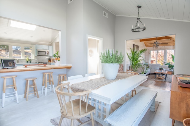 70 N Lake Shore Dr, Brookfield, CT 06804 - dining space featuring high vaulted ceiling, visible vents, and wood ceiling