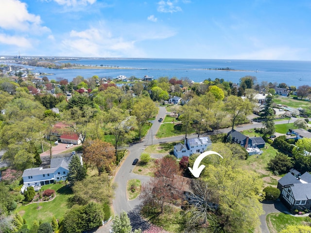 bird's eye view with a water view and a residential view