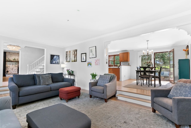 245 Sailors Ln, Bridgeport, CT 06605 - living area featuring a chandelier, stairs, baseboards, light wood-type flooring, and ornamental molding