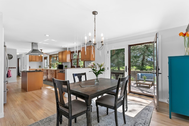 245 Sailors Ln, Bridgeport, CT 06605 - dining space with an inviting chandelier, recessed lighting, and light wood finished floors