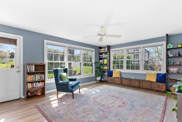 245 Sailors Ln, Bridgeport, CT 06605 - living area featuring a ceiling fan, plenty of natural light, and light wood-type flooring