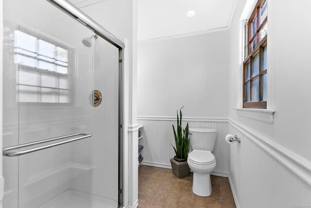 245 Sailors Ln, Bridgeport, CT 06605 - full bathroom featuring wainscoting, a stall shower, and toilet