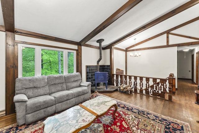 49 Birch Hill Rd, Newtown, CT 06470 - living room with a wood stove, hardwood / wood-style floors, and a chandelier