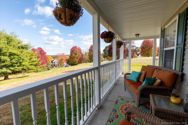balcony featuring a porch