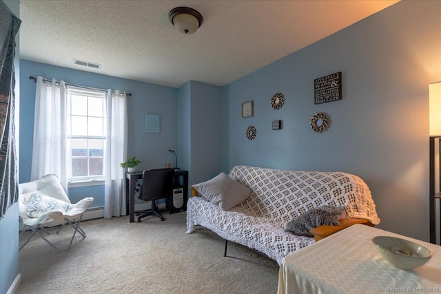 carpeted bedroom with a textured ceiling and visible vents