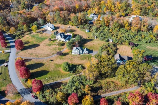 aerial view featuring a view of trees