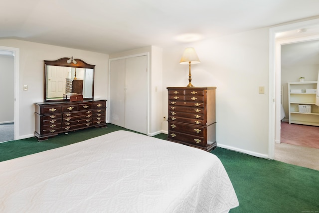 bedroom featuring a closet, baseboards, and dark colored carpet