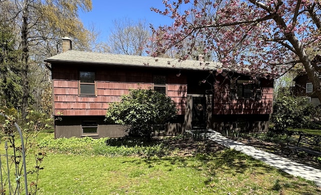 653 Andrew Mountain Rd, Naugatuck, CT 06770 - exterior space with a lawn, a chimney, and a shingled roof