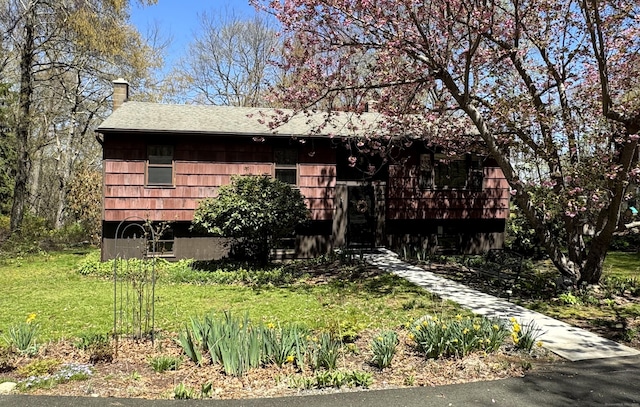 653 Andrew Mountain Rd, Naugatuck, CT 06770 - view of front of house with roof with shingles and a chimney