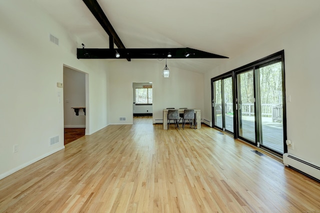 unfurnished living room featuring visible vents, beam ceiling, wood finished floors, high vaulted ceiling, and a baseboard heating unit