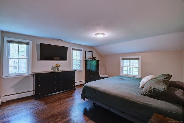 267 Foote Rd, Glastonbury, CT 06073 - bedroom featuring baseboard heating, a baseboard radiator, dark wood-style flooring, vaulted ceiling, and baseboards