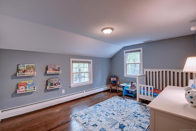 267 Foote Rd, Glastonbury, CT 06073 - bedroom with a baseboard heating unit, vaulted ceiling, wood finished floors, multiple windows, and baseboards
