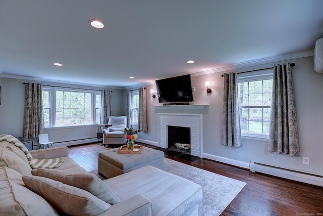 267 Foote Rd, Glastonbury, CT 06073 - living area featuring crown molding, a fireplace, recessed lighting, dark wood finished floors, and baseboards