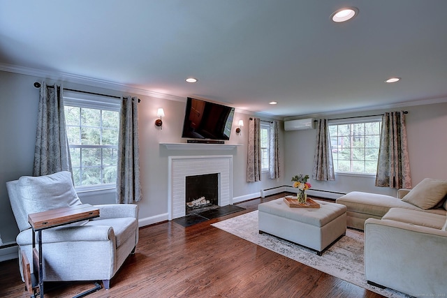 267 Foote Rd, Glastonbury, CT 06073 - living room featuring crown molding, a wall mounted AC, a fireplace, recessed lighting, and wood finished floors