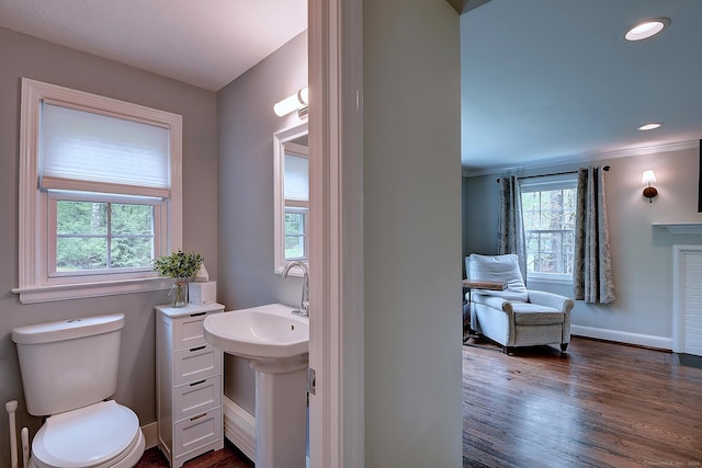 267 Foote Rd, Glastonbury, CT 06073 - bathroom featuring toilet, baseboards, wood finished floors, and ornamental molding