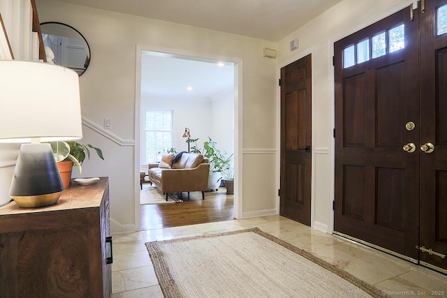 entryway with recessed lighting, baseboards, and a healthy amount of sunlight