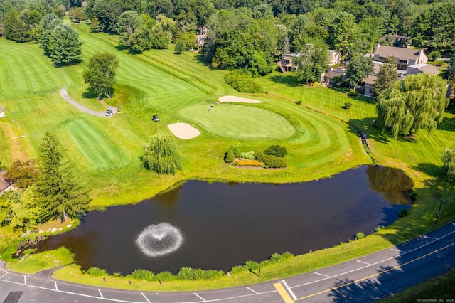 birds eye view of property featuring a water view and golf course view