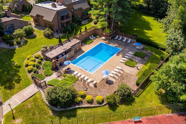 community pool featuring fence